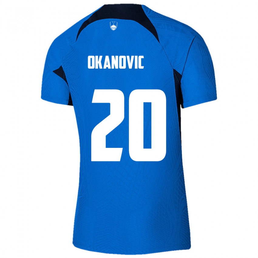 Gyermek Szlovénia Deen Okanovic #20 Kék Idegenbeli Jersey 24-26 Mez Póló Ing